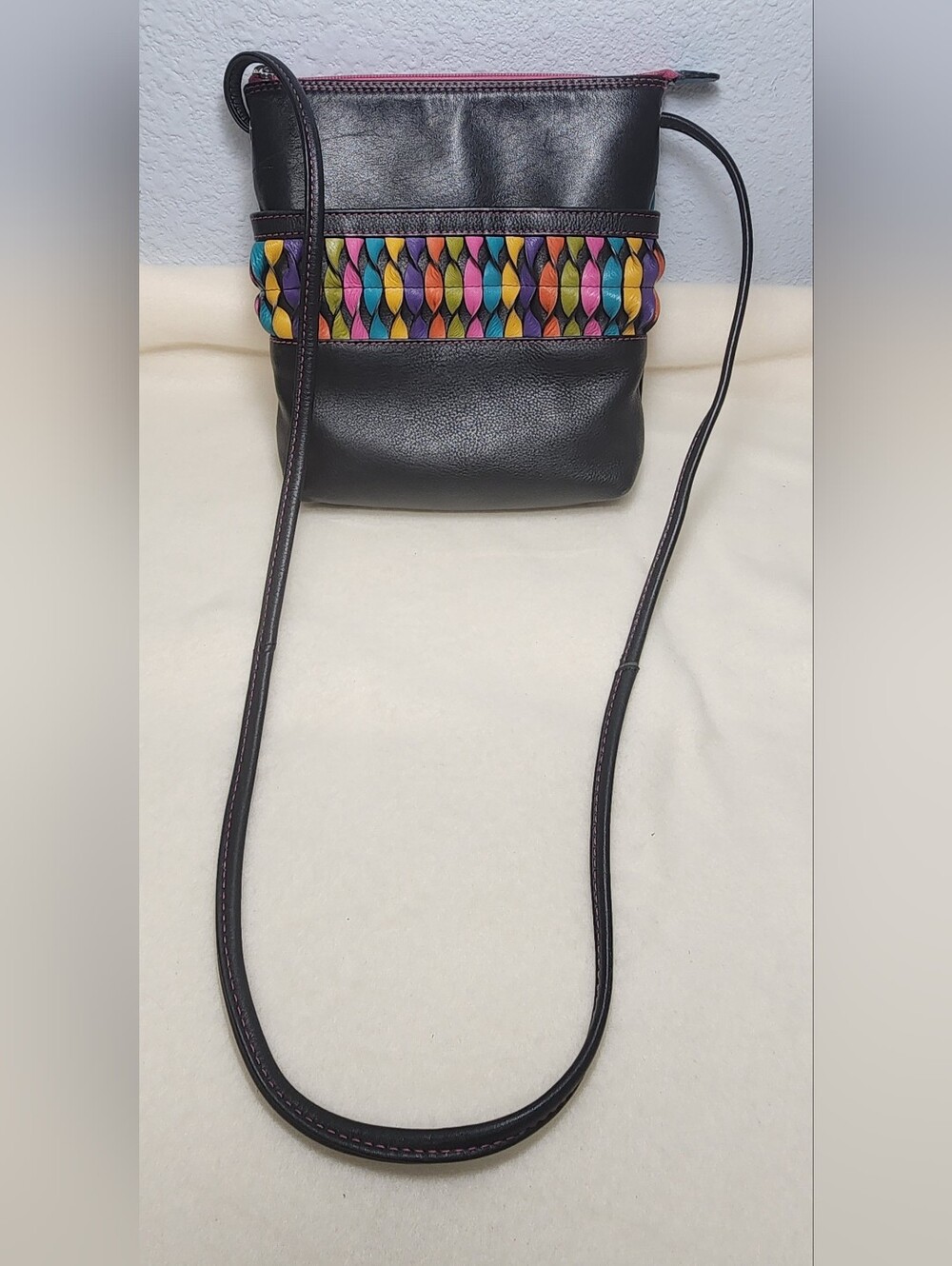 Black Leather Crossbody Bag with Colorful Woven Accent